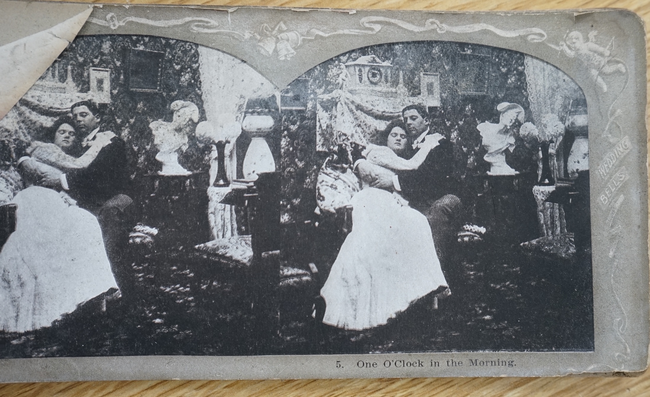 An R.K. White Co. stereoscopic viewer and a collection of slides, viewer 33cm long. Condition - cards have been damp at some point